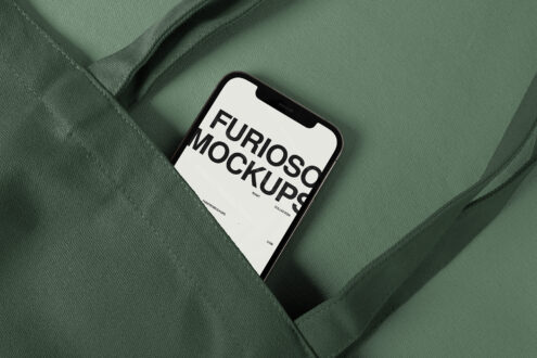 iPhone with cream screen on sage green textured fabric background