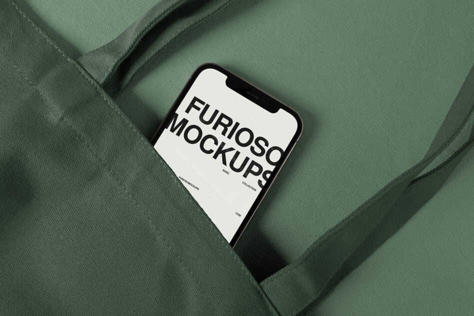iPhone with cream screen on sage green textured fabric background