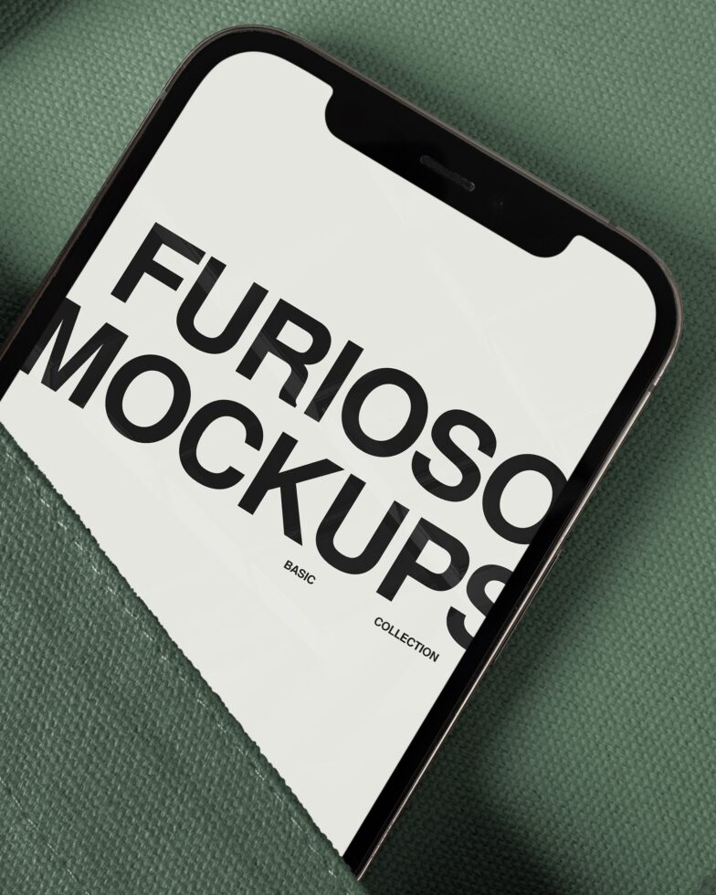 Smartphone displaying Furioso mockup text on cream screen with green fabric texture