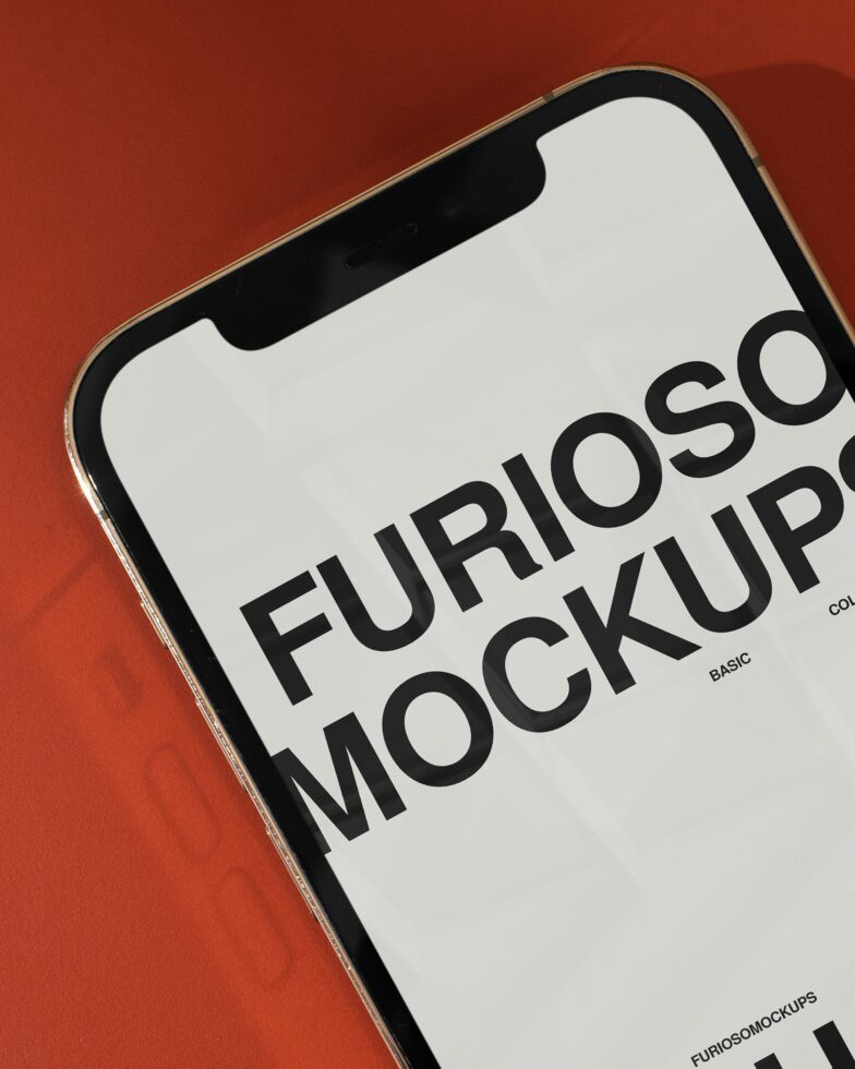iPhone mockup with notch on burnt orange background showing white screen display