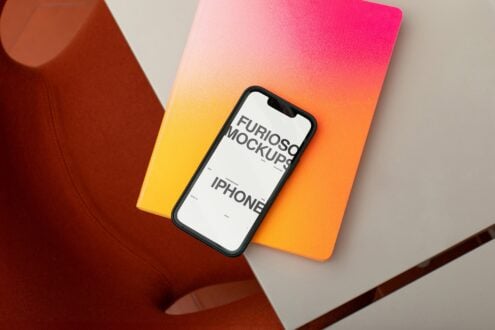 iPhone mockup on colorful gradient card with white screen showing Furioso typography