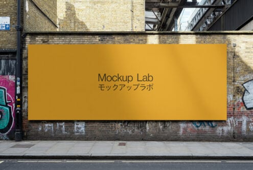 Gold horizontal billboard with Mockup Lab text on industrial brick backdrop