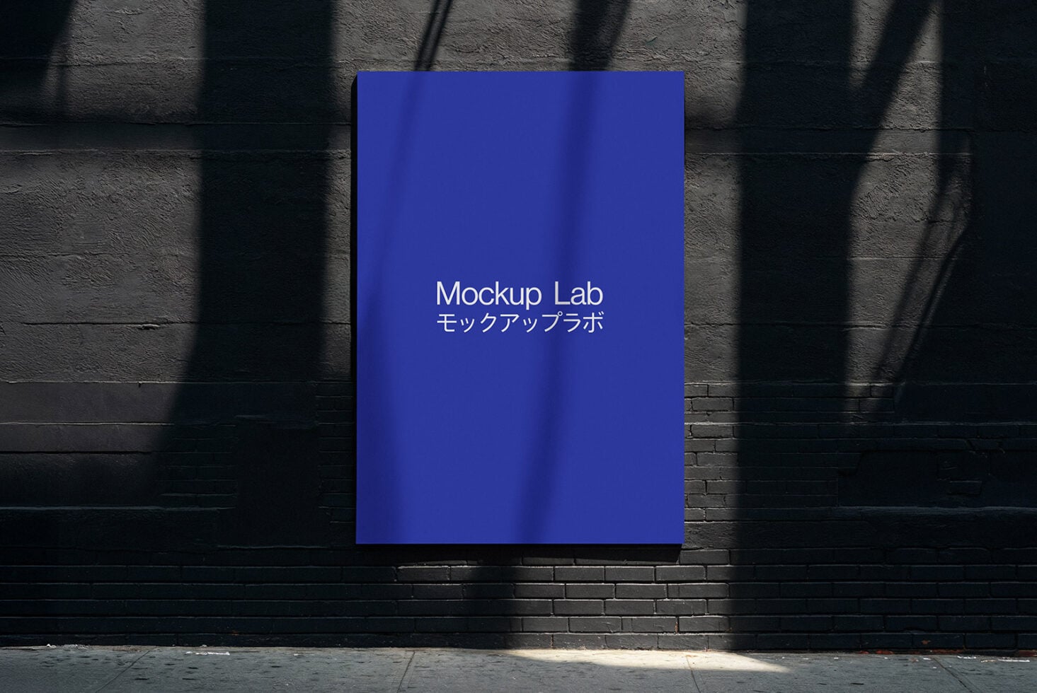 Vertical sign on dark wall glowing deep blue with window shade shadows