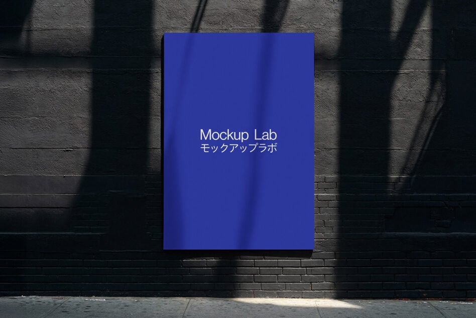 Vertical sign on dark wall glowing deep blue with window shade shadows