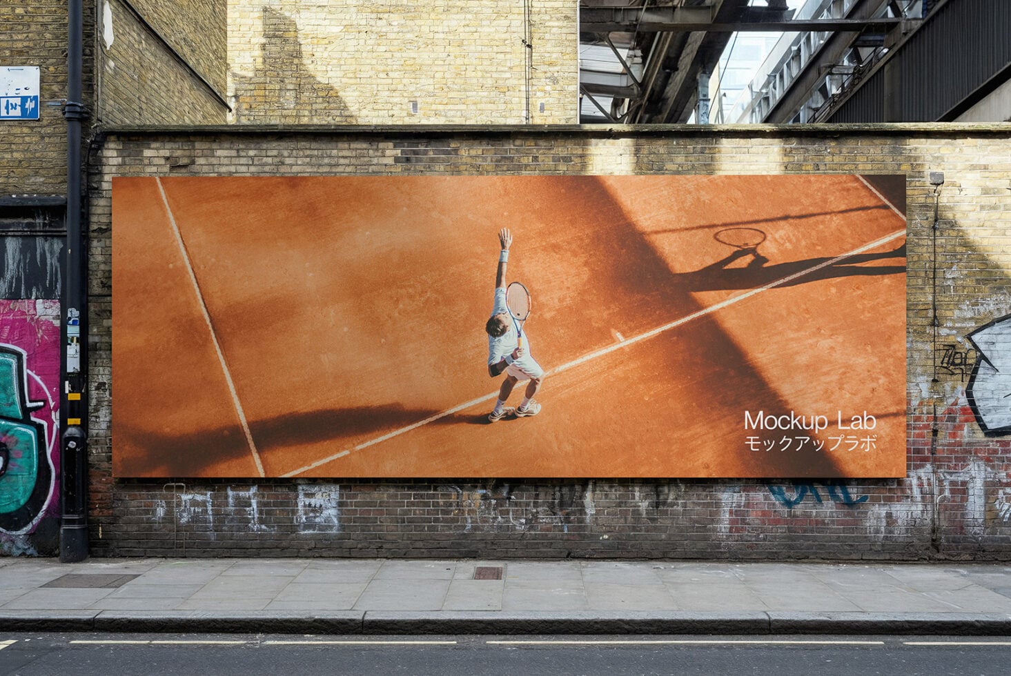 Wide billboard showing tennis player mid-serve on orange clay court