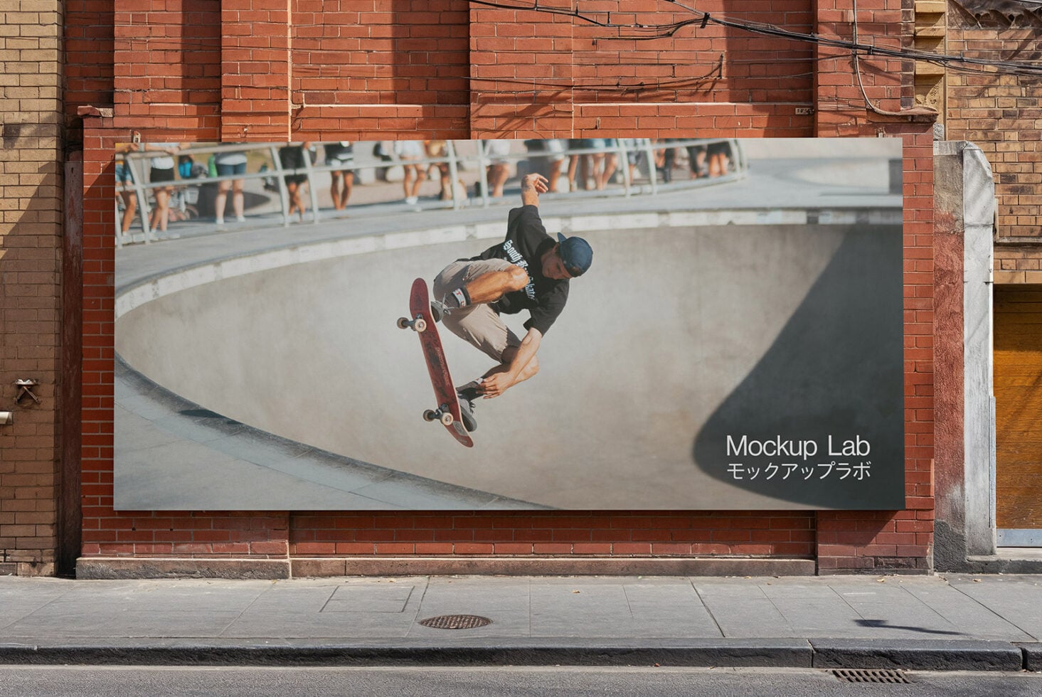 Large horizontal billboard with skateboarder mid-trick in concrete bowl