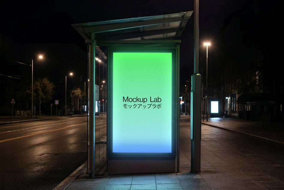 Bus shelter at night with gradient screen transitioning from green to cyan on dark street