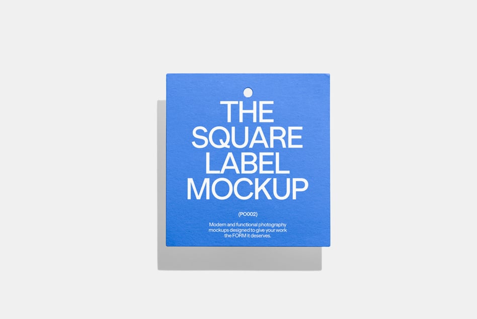 Square blue label mockup with hole punch on soft gray background display