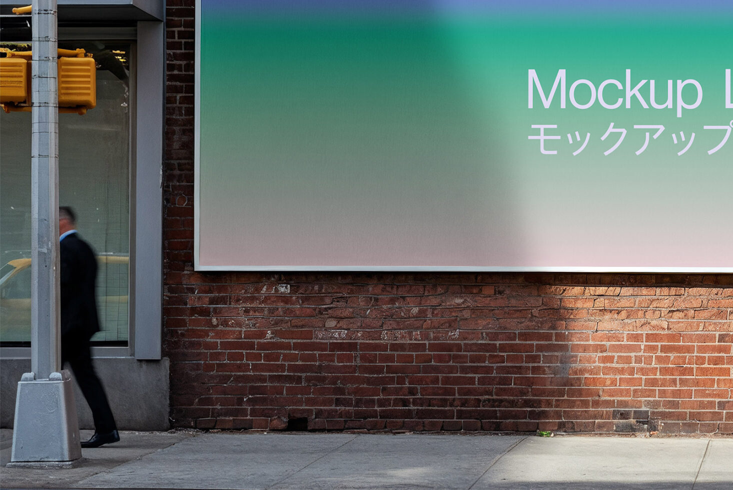 Street-level billboard with gradient from teal to pink, brick wall behind