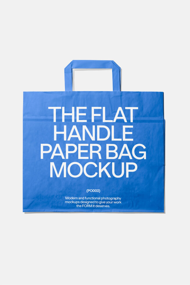 Bright blue flat handle paper bag mockup with white carrying straps visible