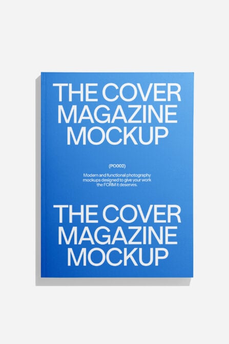 Magazine cover mockup showing front facing blue covers with bold white text