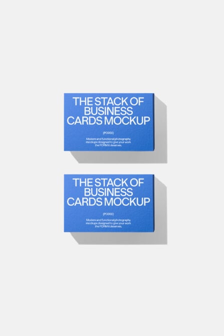 Two stacked business card mockups with bright blue covers, subtle gray shadows underneath each stack