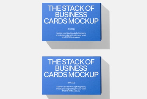 Stacked business cards mockup in bright blue with white typography