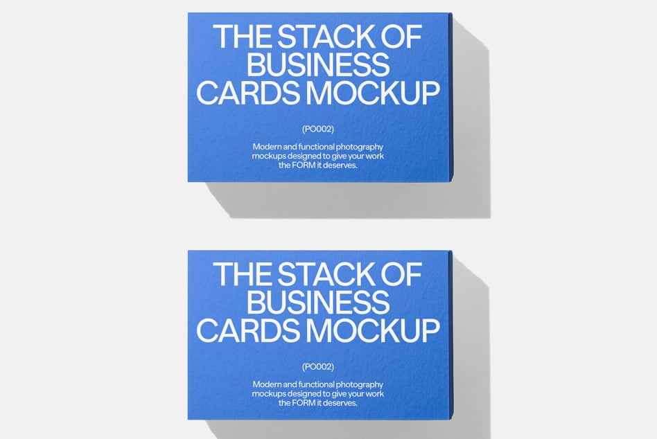 Stacked business cards mockup in bright blue with white typography