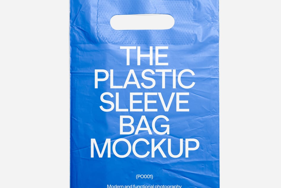 Blue plastic carrying bag mockup with white rounded die-cut handles, bold white typography displayed