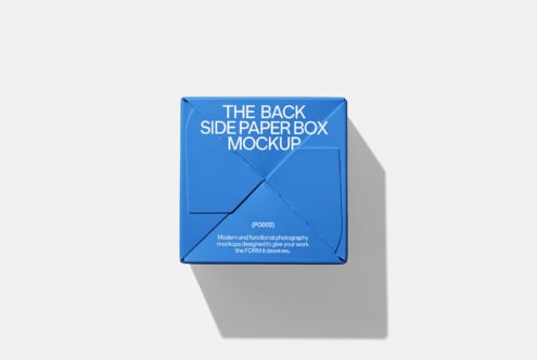 Blue paper box mockup with back panel view on light gray background