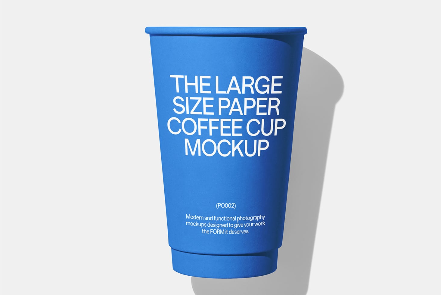 Bright blue paper coffee cup mockup with white text on white background