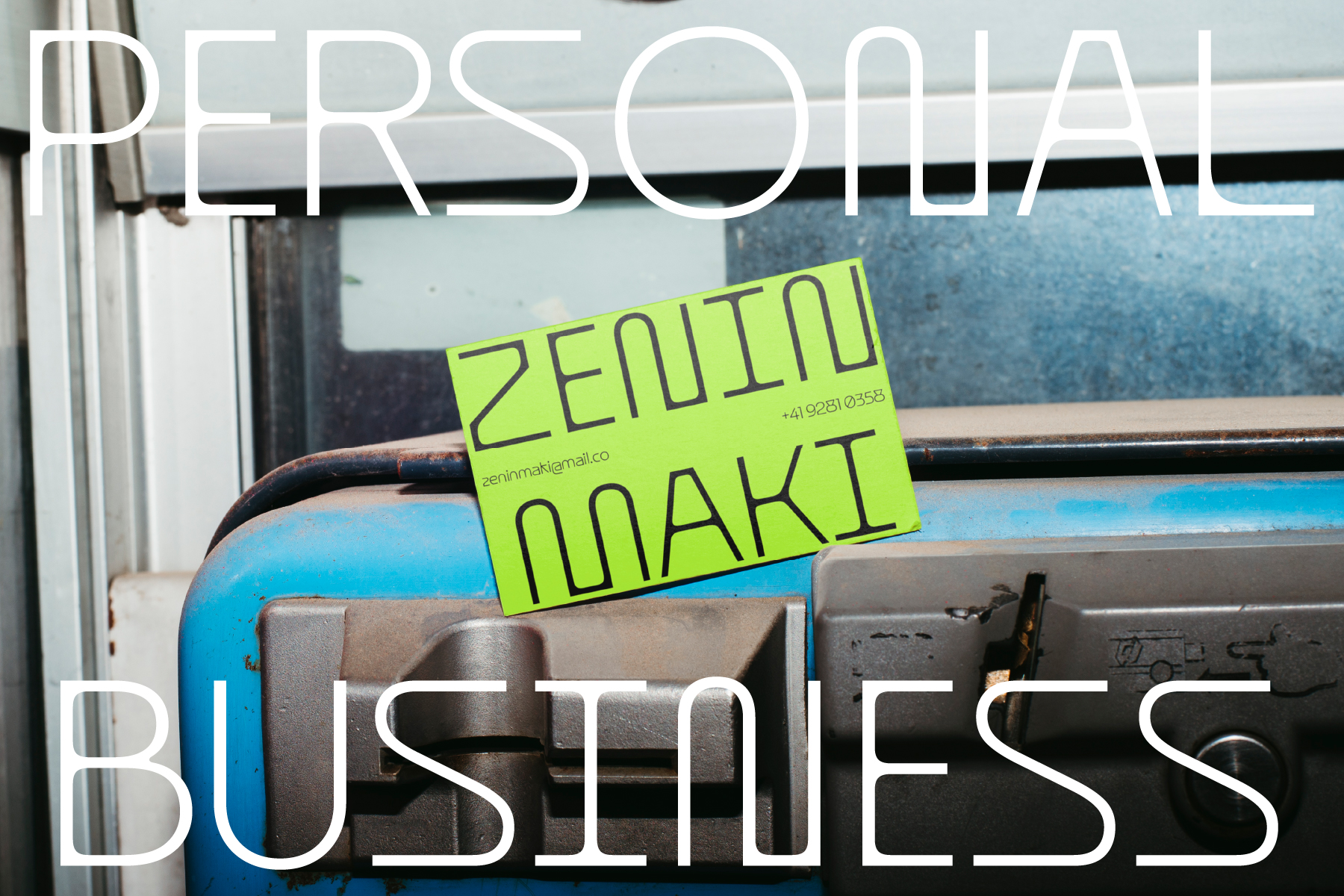 White serif text reading Personal Business overlaid on blue vintage suitcase with neon yellow sticker