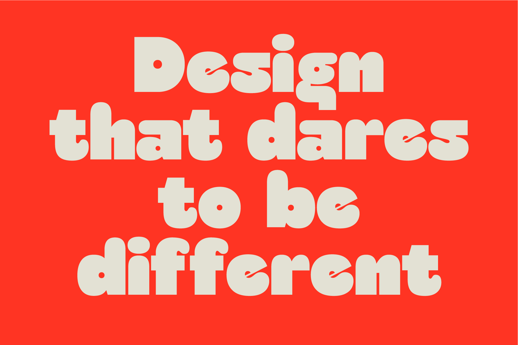 Cream sans serif text reading design that dares to be different on bright red background