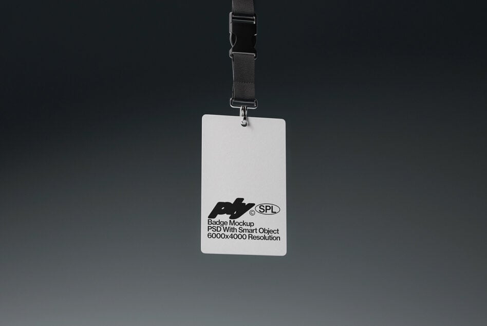 Clean white credential card with metal clasp on black adjustable strap