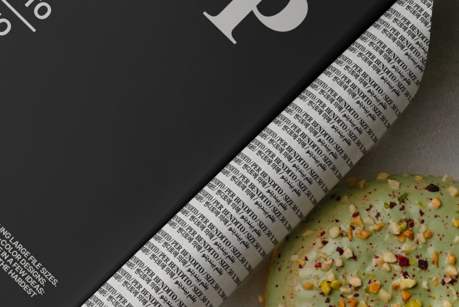 Dark book cover detail with repeated text pattern near seeded crackers
