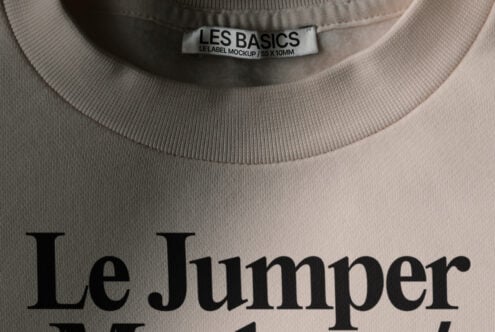 Pale pink sweatshirt with Les Basics woven neck label displaying Le Jumper branding