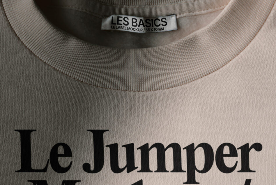 Pale pink sweatshirt with Les Basics woven neck label displaying Le Jumper branding