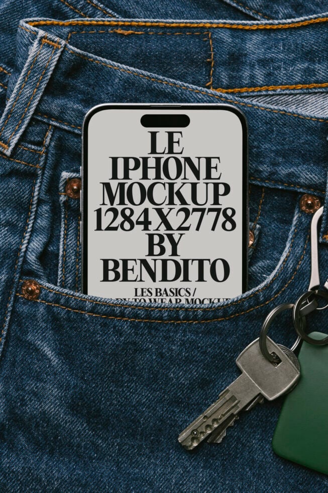 Light phone mockup on denim pocket with silver keys beside it for product display