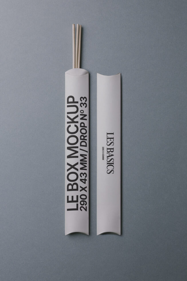 White cylindrical box with wooden sticks, branded Le Box Mockup, front view
