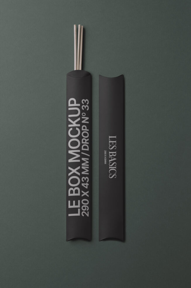 Black cylindrical box with wooden sticks, branded Le Box Mockup, front view