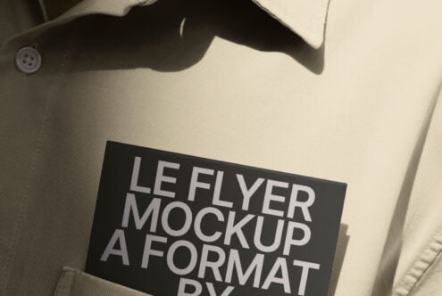Black leaflet mockup displayed on cream linen blazer with natural shadow