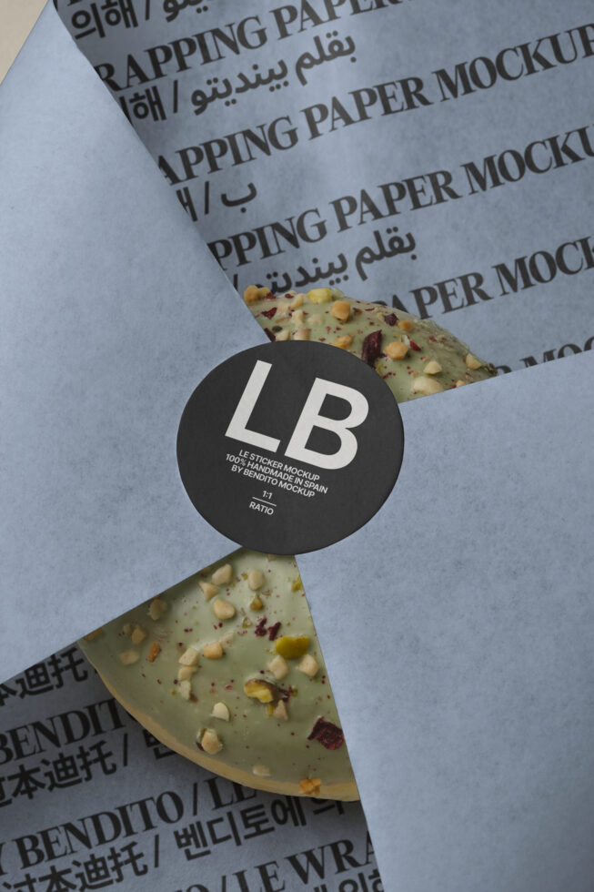Black circular sticker mockup on seeded cracker packaging with wrapped paper background