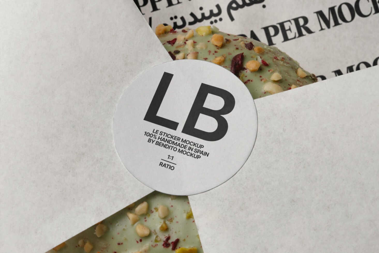 White circular sticker mockup positioned on textured cracker surface with cream paper backdrop