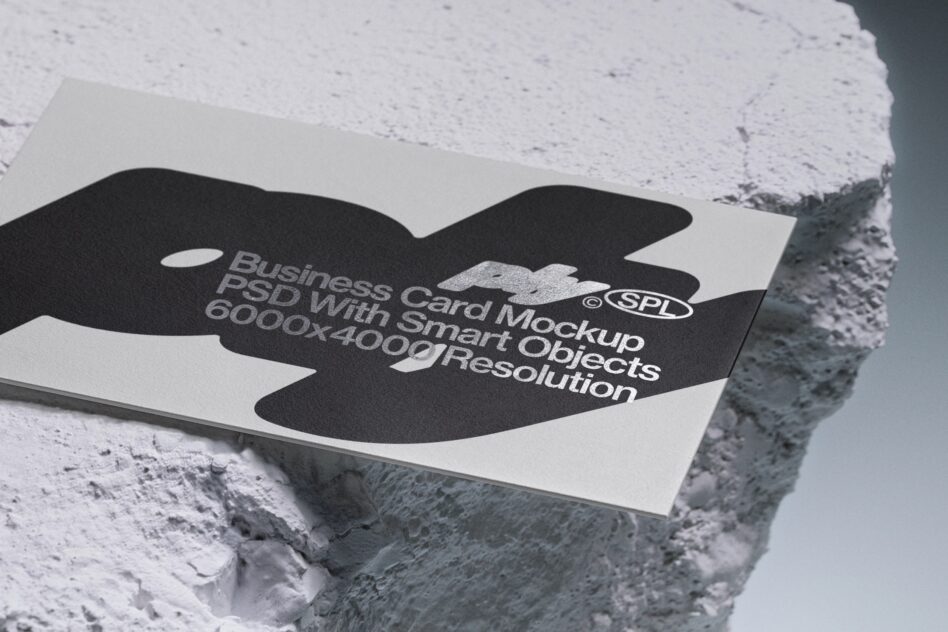 Business card mockup with black organic shape on concrete surface