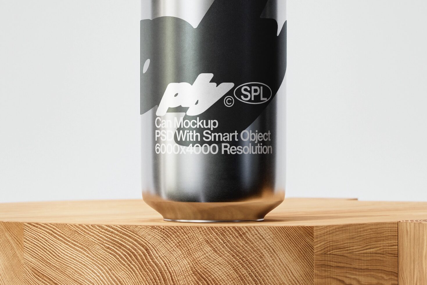 Metallic can mockup on wooden shelf with white logo printed on dark body
