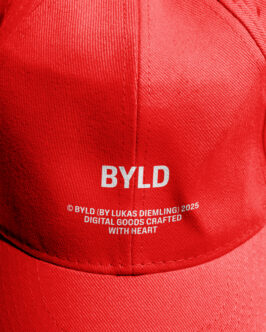 Red cap showing BYLD branding with copyright text on back