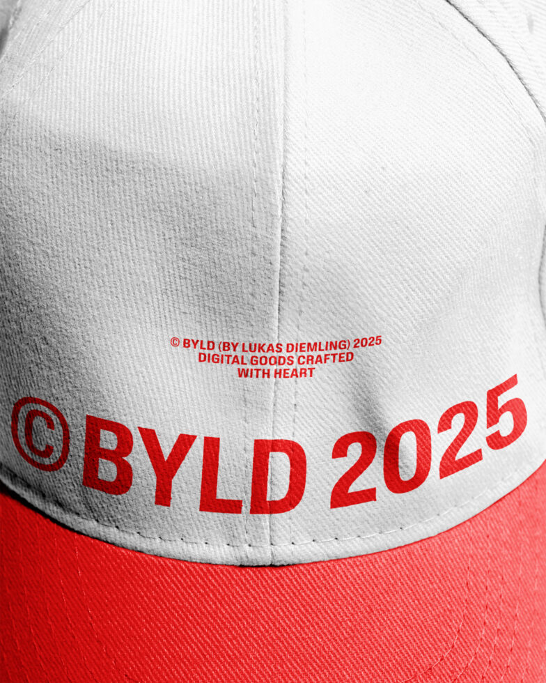 Red white split cap close up with red BYLD 2025 embroidery