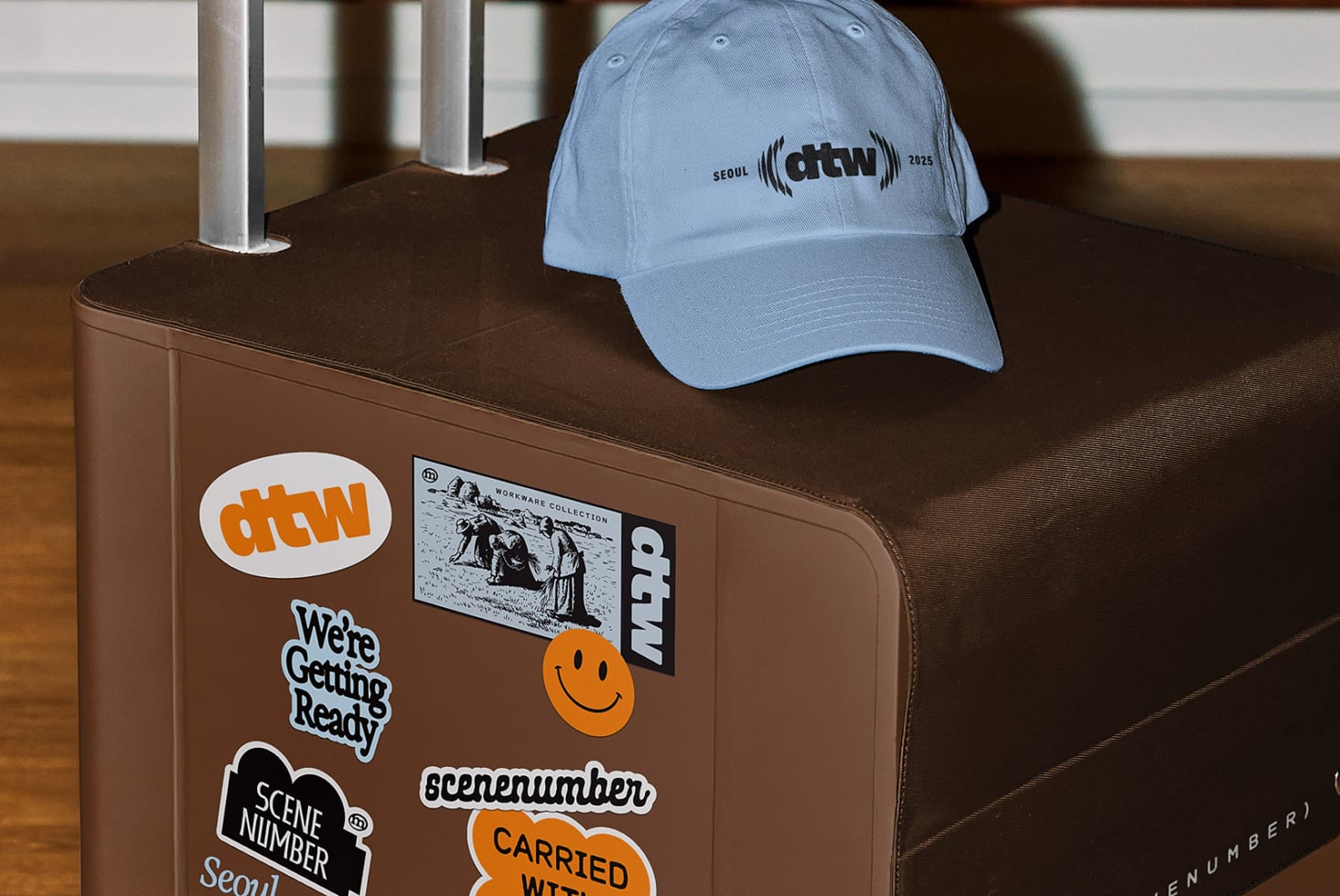 Light blue cap mockup with stickers on brown hand cart display