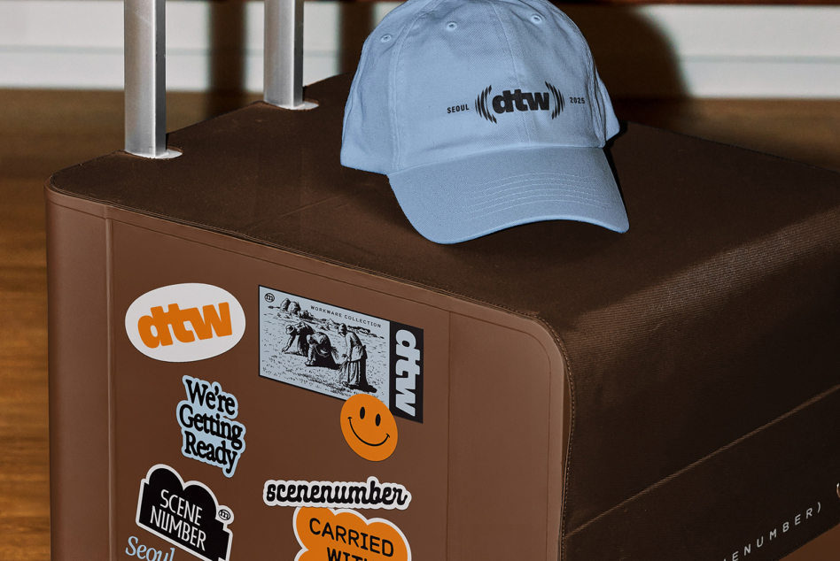 Light blue cap mockup with stickers on brown hand cart display