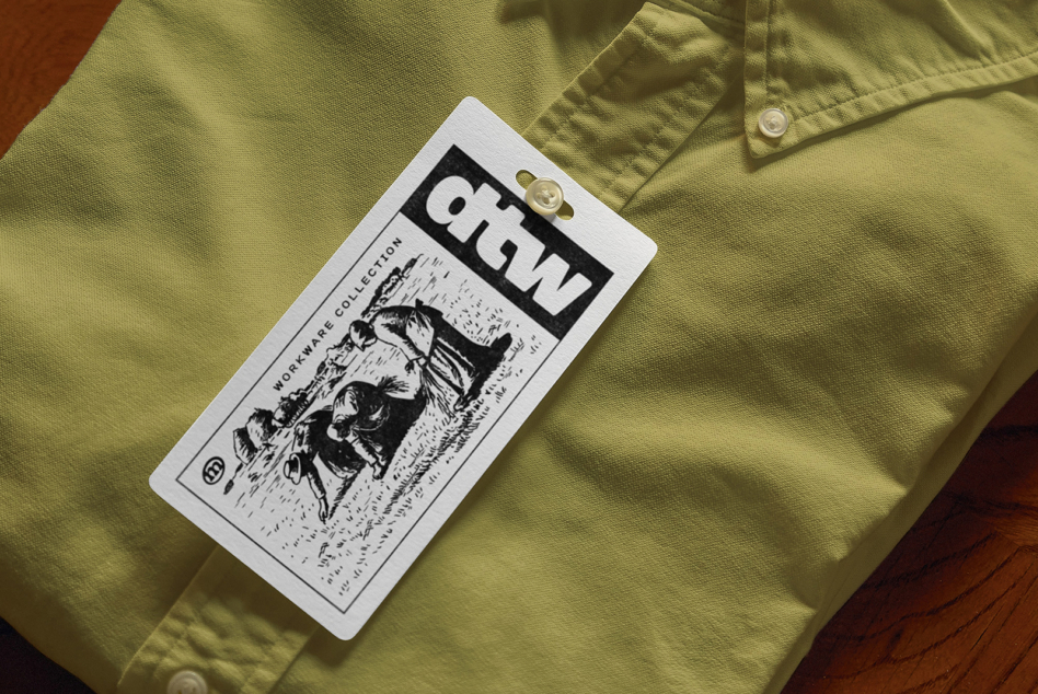 Lime green shirt with white hang tag mockup featuring black branding