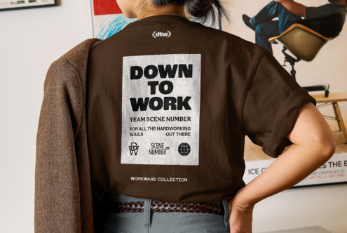 Brown shirt back displaying Down To Work text on light rectangular patch placement
