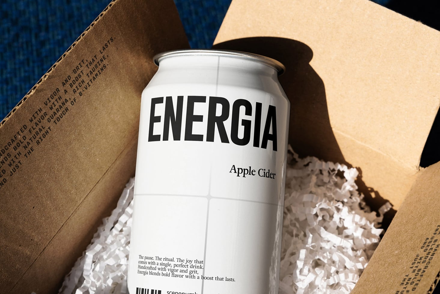 White Energia apple cider can in kraft box with packing material