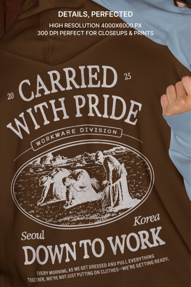 Brown hoodie with Carried with Pride workwear print, engraved pastoral scene design