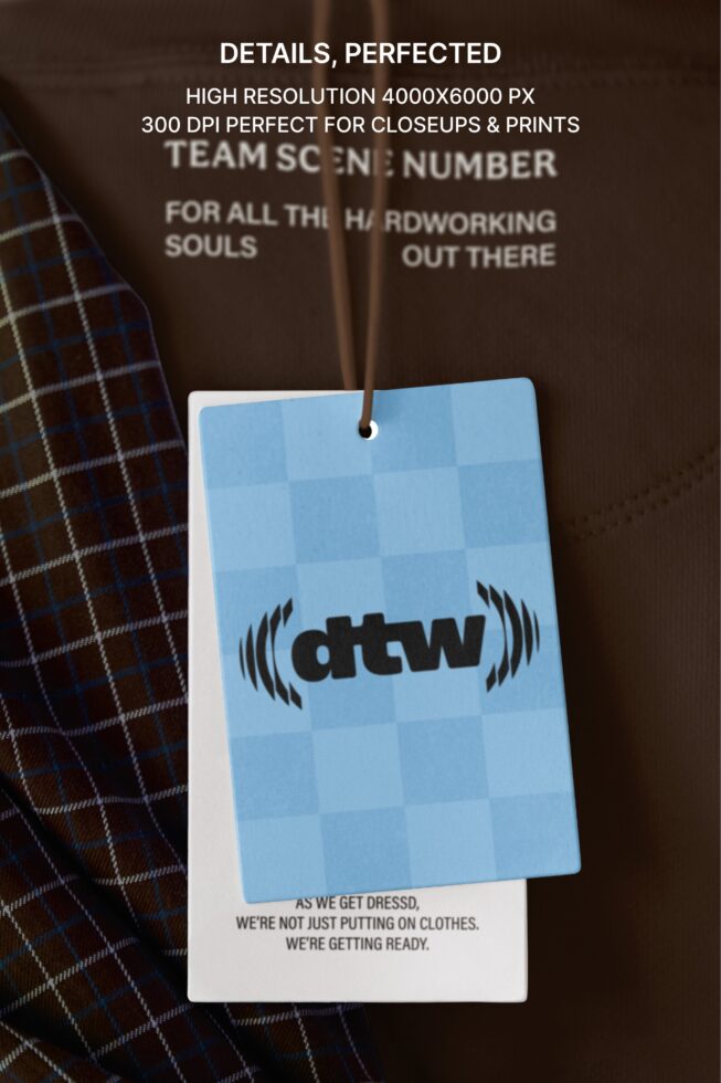 Light blue hang tag on plaid fabric with workwear logo branding mockup