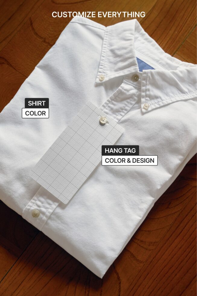 White button up shirt flat lay with customizable color hang tag template