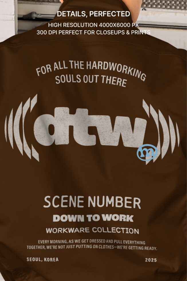 Brown shirt back view displaying 'Carried with pride' graphic with engraved illustration from Scene Number Down to Work collection
