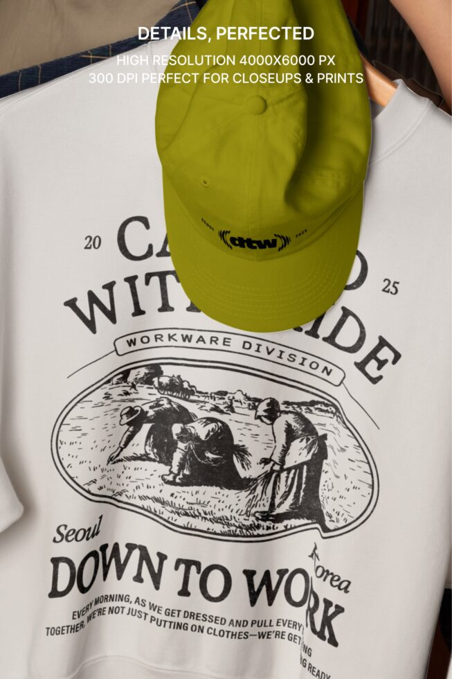 Overhead of lime cap with dtw logo resting on white tee with full back print