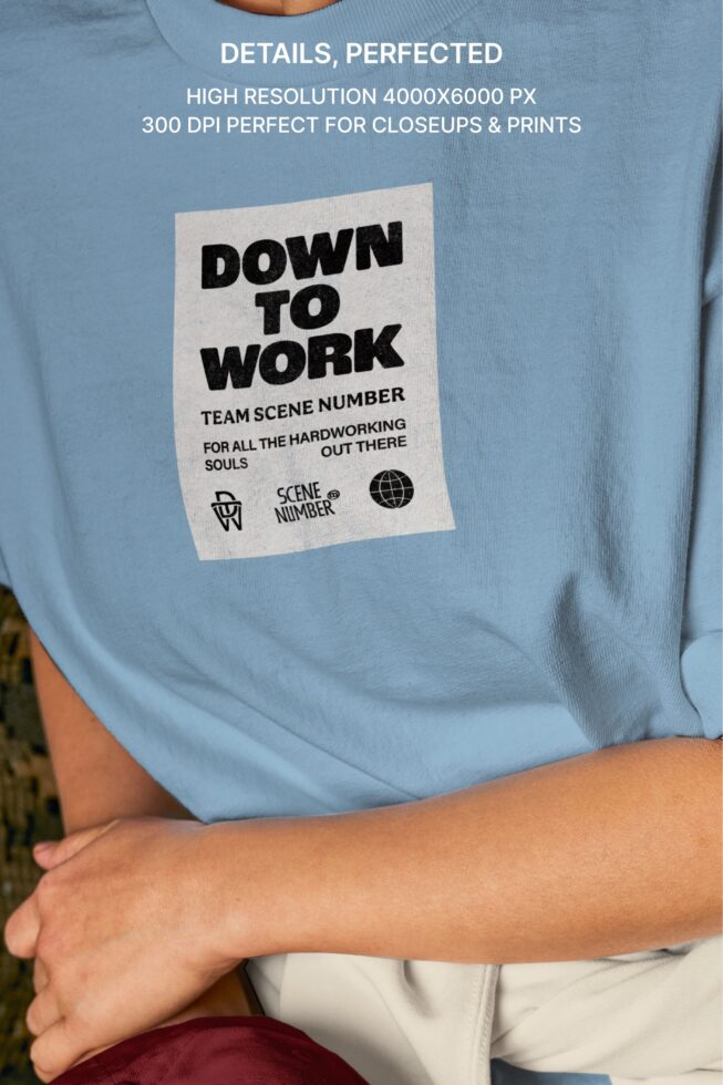 Light blue crewneck tee with Down to Work Team Scene Number print on chest