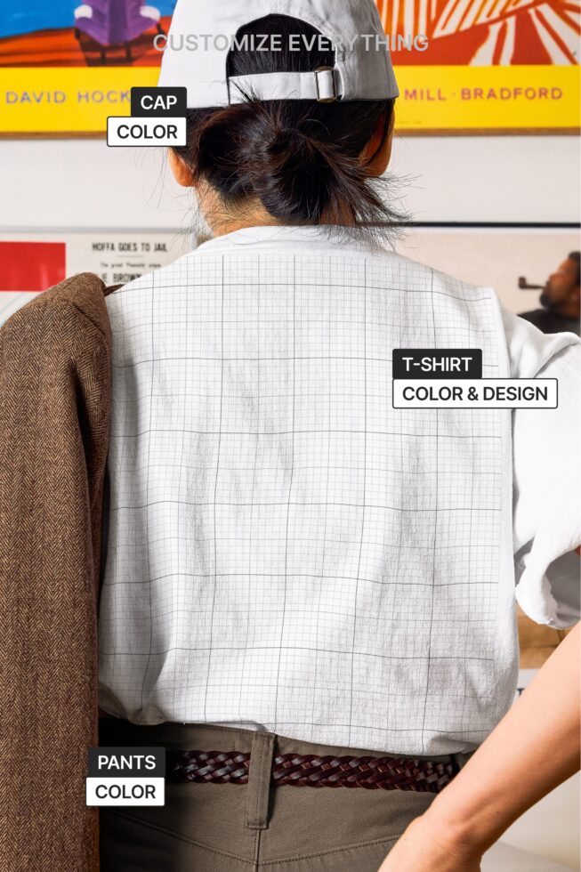 Back view of person wearing grid tee, cap, showing all customizable garment areas