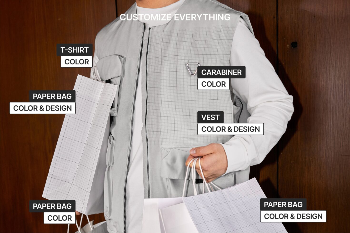 Cream vest worn with white long sleeve, light gray carabiner, multiple branded paper bags on model